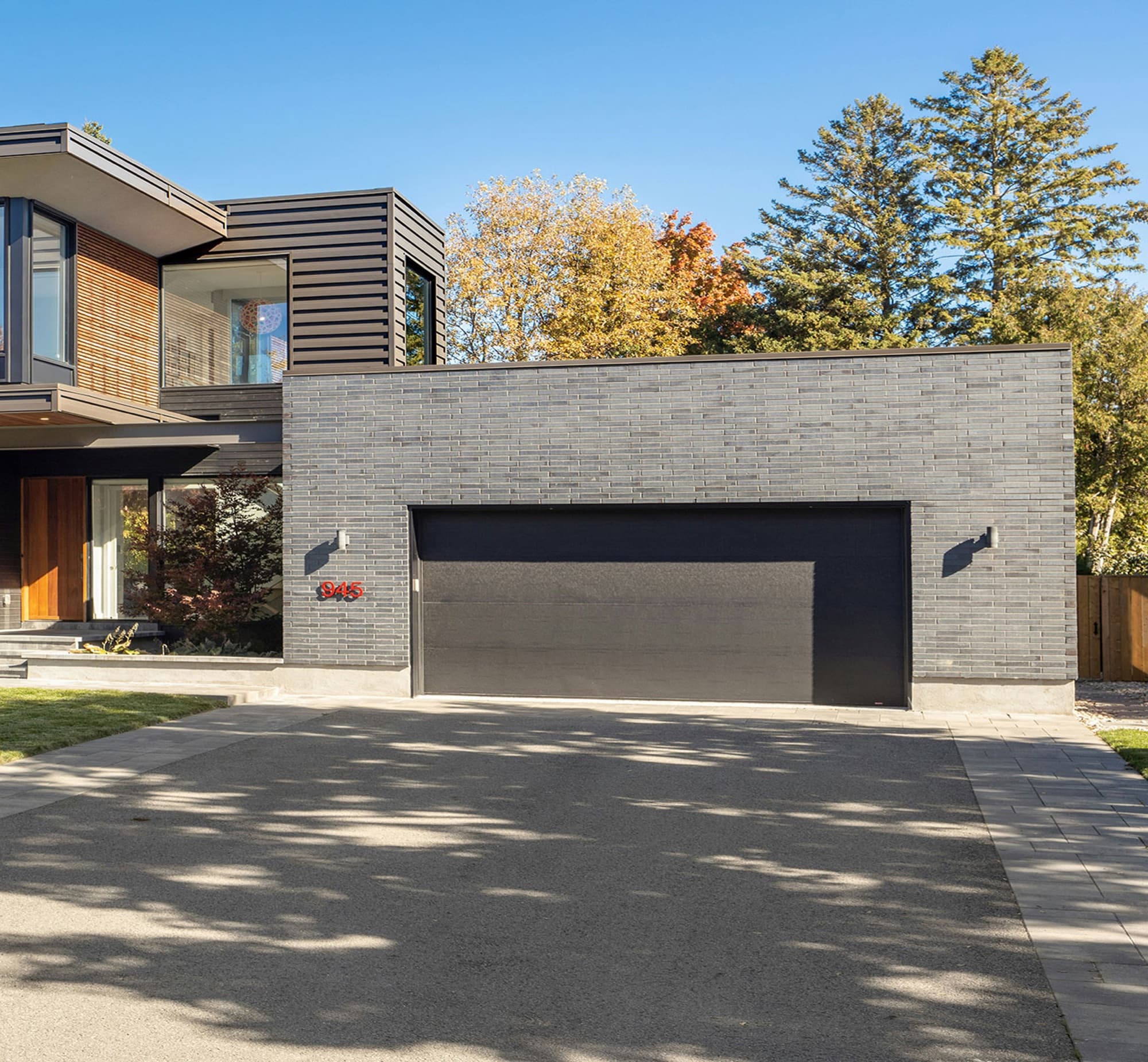 Modern home with a dark garage door